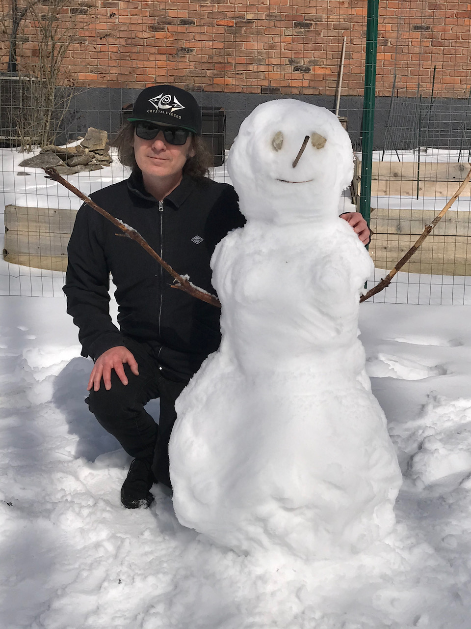 Mark Bray with a snow person February 2021